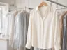 Cleaned and pressed silk blouse on a hanger