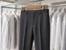 Freshly pressed dress pants on a hanger
